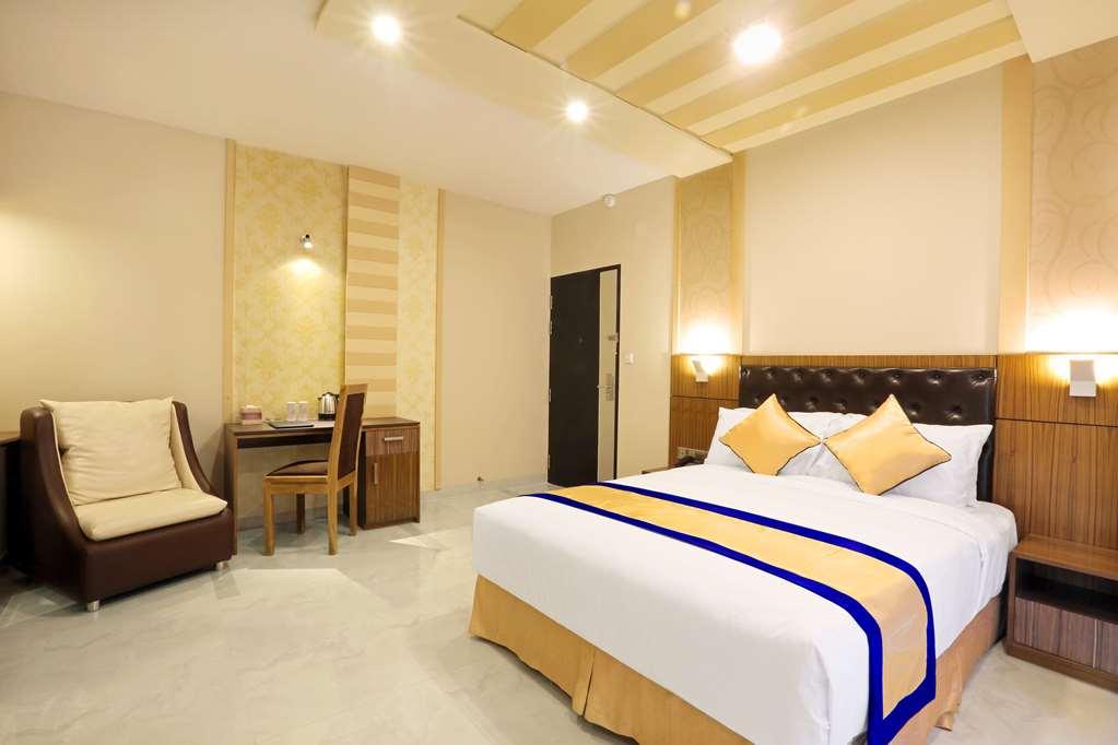 Asia Hotel & Resorts Daca Quarto foto
