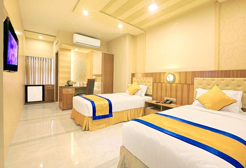 Asia Hotel & Resorts Daca Quarto foto